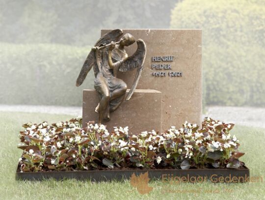 Grafmonument met bronzen beeld