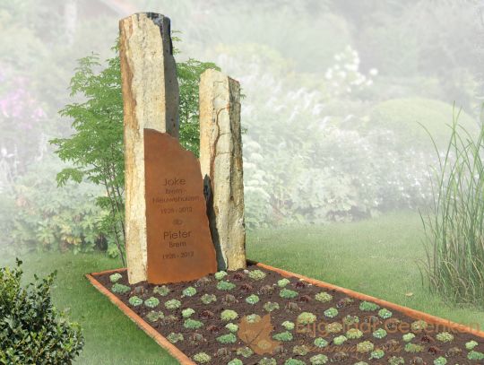 Grafmonument met grafzuilen van basalt