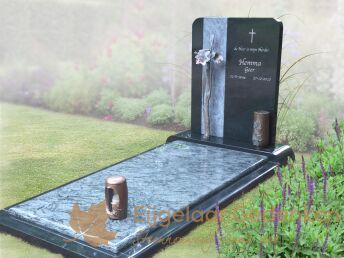 Exclusief grafmonument met bronzen grafaccessoires