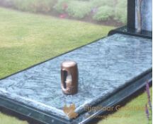 Exclusief grafmonument met bronzen grafaccessoires foto 3