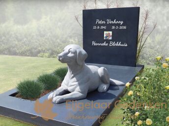 Familie grafsteen met beeld van een hond