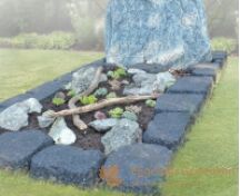 Grafmonument met blauw ruw natuursteen foto 3