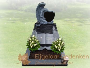 Grafmonument met uitgehakte engel