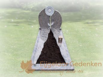 Grafmonument met uitgehakte zonnebloem