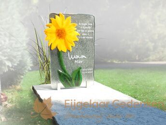 Grafmonument van glas met een zonnebloem