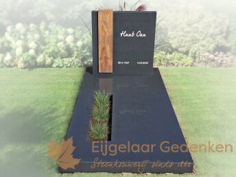 Grafsteen met houten decoratie