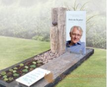 Modern glazen grafmonument met ruwe steensoorten foto 1