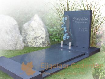 Modern grafmonument met glas