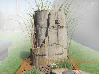 Natuurlijk grafmonument met bronzen accessoires