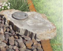 Natuurlijk grafmonument met bronzen accessoires foto 2