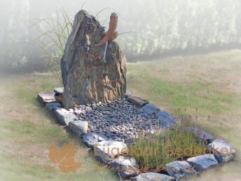 Natuurlijke grafsteen met vogel cortenstaal