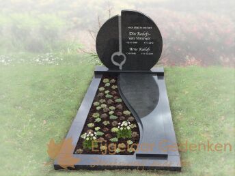 Rond grafmonument met hartje